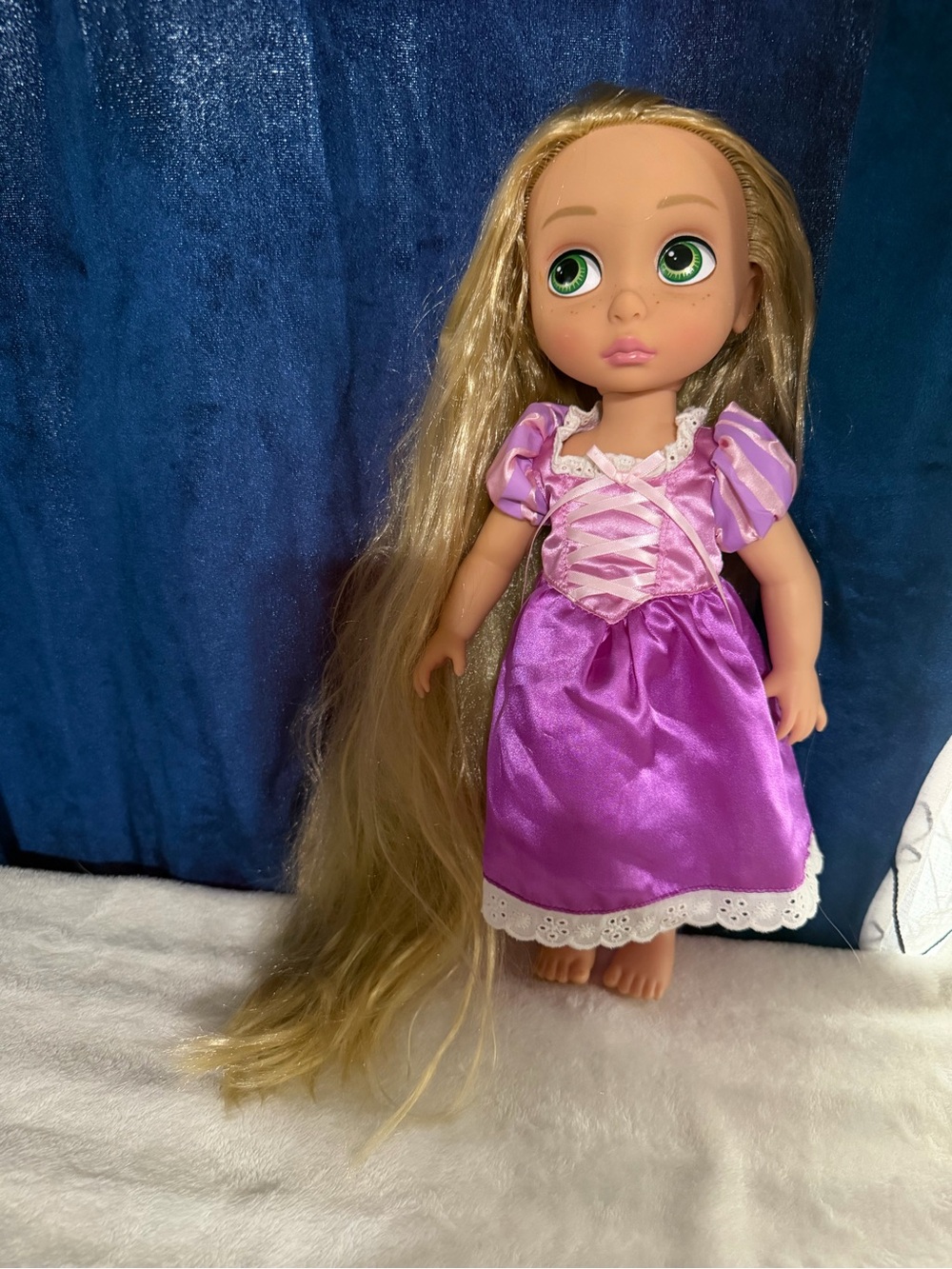 Disney Blonde-Haired Doll in Purple Dress with Green Eyes